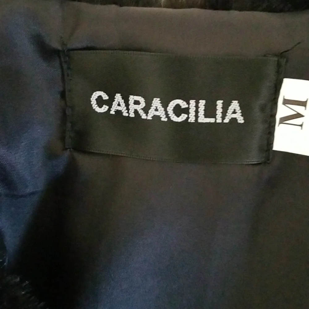 Caracilia Short Faux Fur Vest - Picture 12 of 14